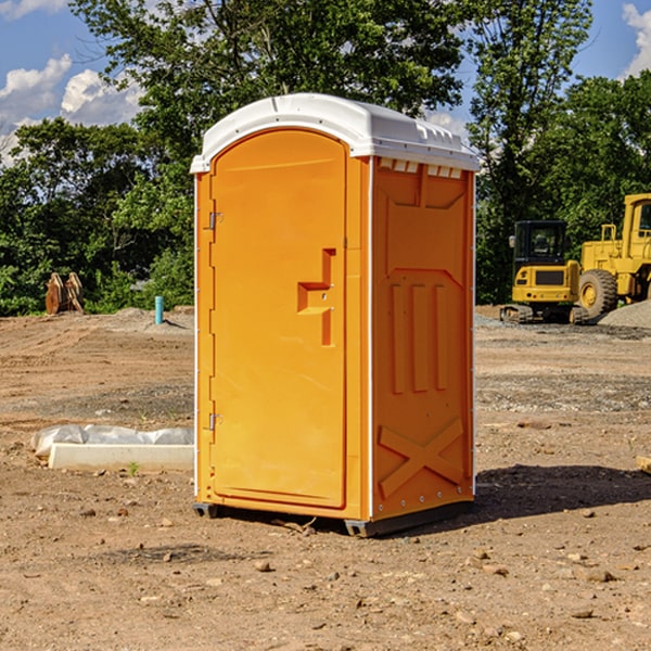 how often are the portable restrooms cleaned and serviced during a rental period in Milan Ohio